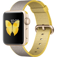 Żółty nylonowy pasek Apple do zegarka Apple Watch z kopertą w kolorze złota, na której wyświetlaczu widoczny jest motyl oraz godzina 10:09.