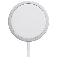 Okrągła ładowarka Apple MagSafe Charger w kolorze białym z aluminiową ramką oraz podłączonym przewodem zasilającym, widok z góry na powierzchnię ładującą.