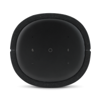 Głośnik Harman Kardon Citation 100 w kolorze czarnym, widok z góry na okrągły panel sterowania z ikonami mikrofonu, Bluetooth oraz regulacji głośności.