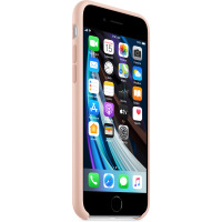 Silikonowe etui Apple w kolorze piaskowego różu nałożone na iPhone SE 2020, widok z boku prezentujący przyciski głośności oraz aktywny ekran główny iOS.