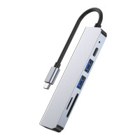 Szara przejściówka USB-C TECH-PROTECT V4-HUB 6IN1 z wtykiem USB-C na kablu, posiadająca dwa porty USB-A, port USB-C oraz dwa sloty na karty pamięci.