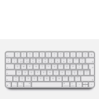 Klawiatura Apple Magic Keyboard w układzie portugalskim z białymi klawiszami i srebrną obudową, widok z góry na pełny układ klawiszy funkcyjnych i liter.