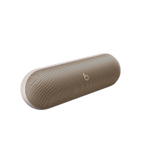 Bezprzewodowy głośnik Beats Pill w kolorze szampańskiego złota o zaokrąglonym, podłużnym kształcie z widocznym logo marki na środku metalowej maskownicy.
