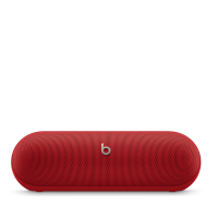 Bezprzewodowy głośnik Beats Pill w kolorze matowej czerwieni z charakterystycznym srebrnym logo marki Beats umieszczonym centralnie na przedniej maskownicy.
