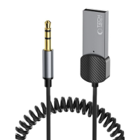 Szary adapter Bluetooth Aux Tech-Protect z wtykiem jack 3,5 mm i złączem USB, połączony czarnym spiralnym kablem na białym tle, widoczne logo producenta.