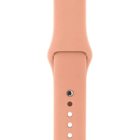Silikonowy pasek Apple do zegarka Apple Watch w kolorze brzoskwiniowym, widok na zapięcie z metalowym pinem oraz rząd otworów do regulacji obwodu nadgarstka.