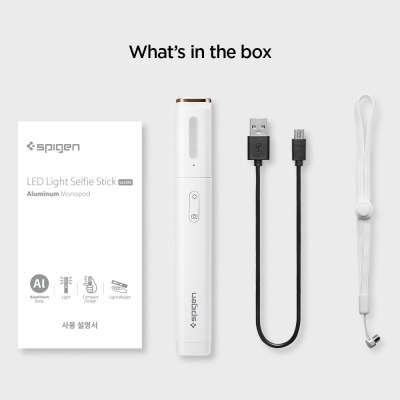 Zawartość zestawu selfie stick Spigen S550W LED: instrukcja obsługi, biały monopod z lampą LED, kabel ładujący USB oraz biała smycz na nadgarstek.