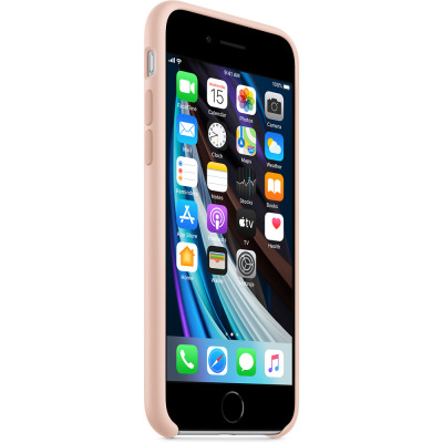 Silikonowe etui Apple w kolorze piaskowego różu nałożone na iPhone SE 2020, widok z boku prezentujący przyciski głośności oraz aktywny ekran główny iOS.