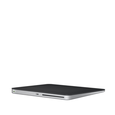 Apple Magic Trackpad w kolorze czarnym, widok z profilu prezentujący smukłą konstrukcję, port ładowania oraz włącznik na bocznej krawędzi urządzenia.