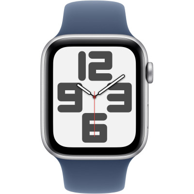 Apple Watch SE2 40mm w srebrnej kopercie z niebieskim paskiem sportowym, widok z boku na tarczę z cyframi 12, 3, 6, 9 oraz przycisk boczny i koronkę.