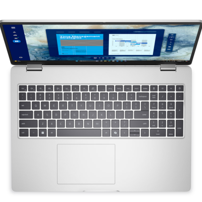Srebrny notebook Dell Pro 16 PC16250 z otwartą klapą, widoczną klawiaturą z blokiem numerycznym oraz ekranem wyświetlającym artykuł o zarządzaniu czasem.